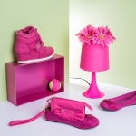 pink shoes and props arranged in studio